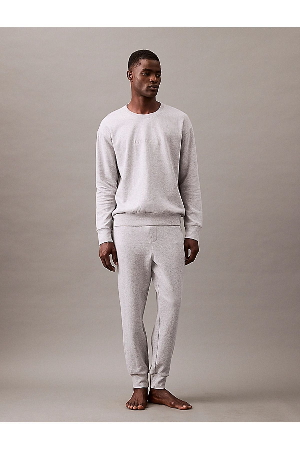 کلوین کلاین شلوار مردانه طرح‌دار سفید طرح جوگر با کمر کشی کد 000NM2706E-QQC