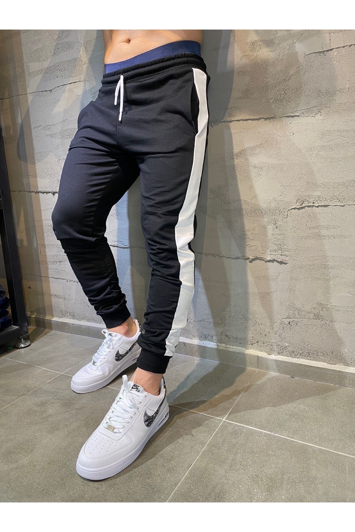Nike striped joggers on sale