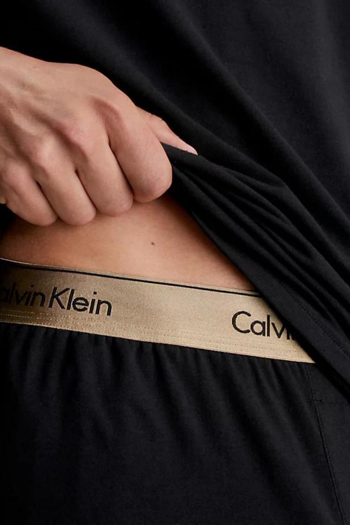 ست گرمکن مشکی مردانه آرم کالوین کلین در درزهای روبان دوچرخه یقه نوار کمر نوشته سیاه Calvin Klein
