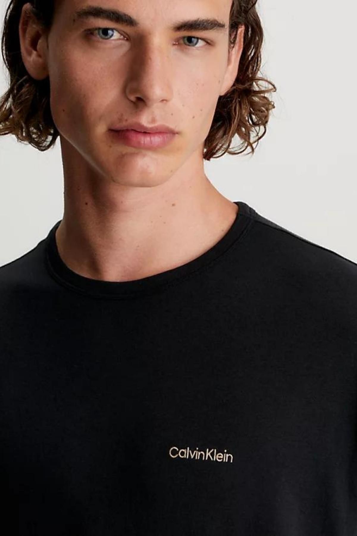 ست گرمکن مشکی مردانه آرم کالوین کلین در درزهای روبان دوچرخه یقه نوار کمر نوشته سیاه Calvin Klein