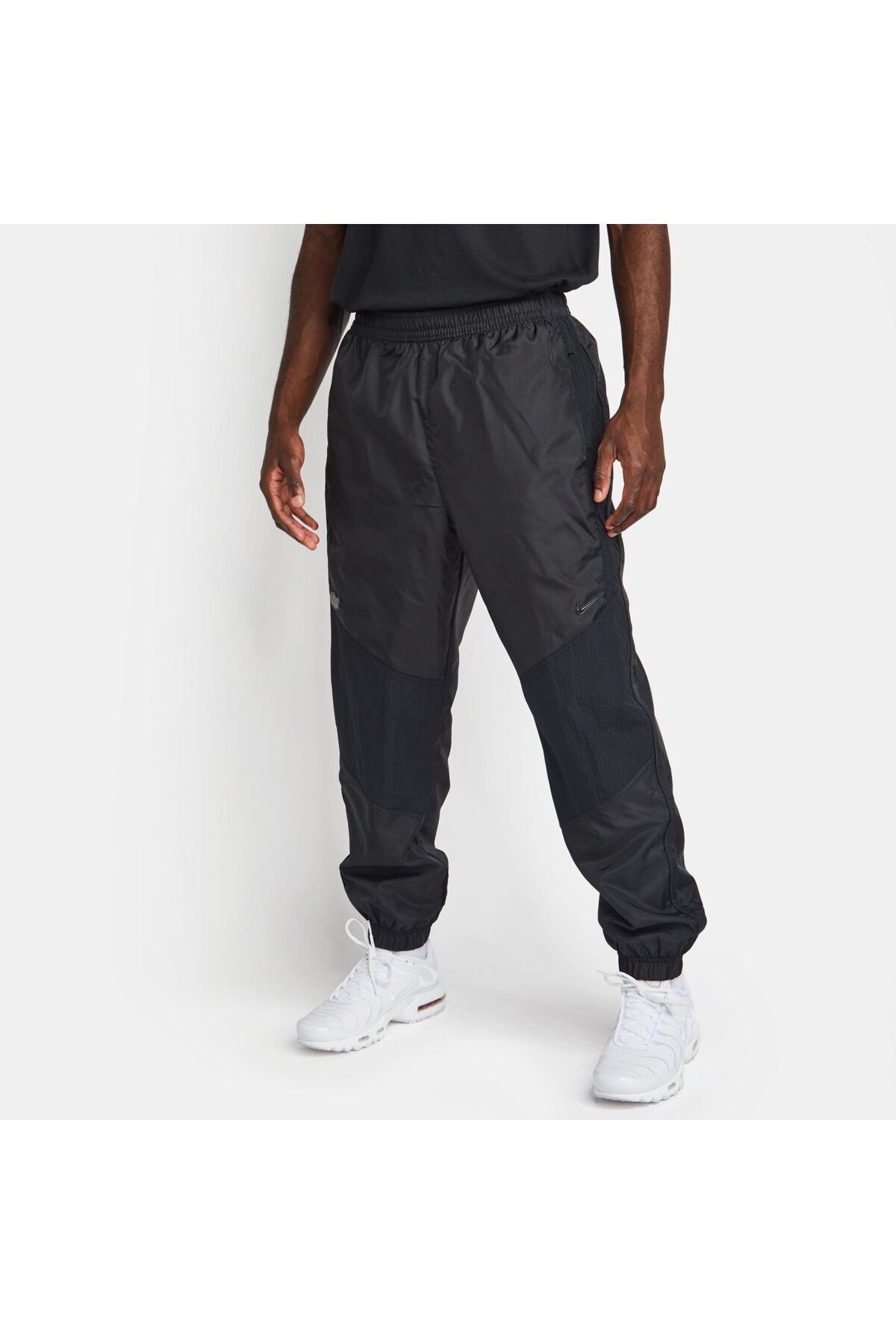 Nike sportswear woven trousers 2025
