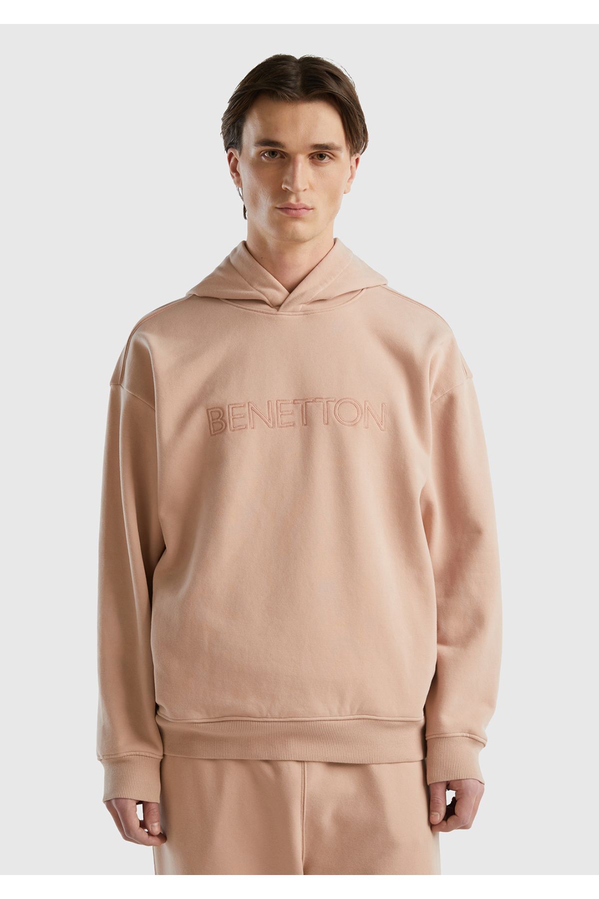 یونایتد کالرز آو بنتون سویشرت مردانه کلاه‌دار طرح صورتی پودری از جنس پنبه با چاپ لوگو در جلو