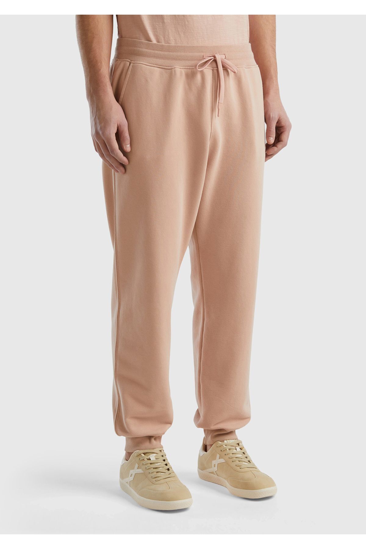 یونایتد کالرز آو بنتون شلوار ورزشی مردانه طرح صورتی پودری نخی با کمر و سرآستین بنددار