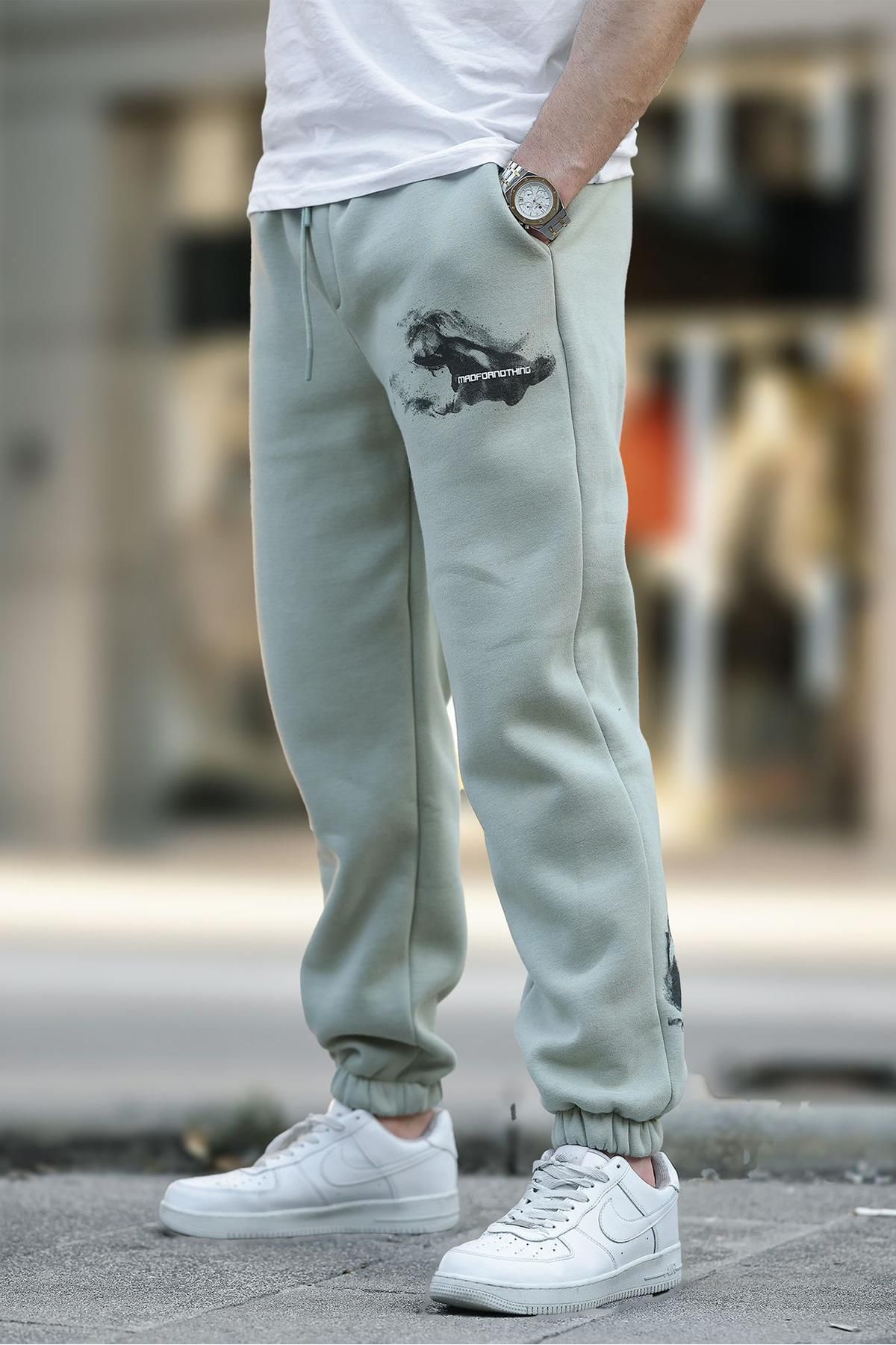 شلوار ورزشی جیبی الاستیک مردانه بژ با چاپ جزئیات