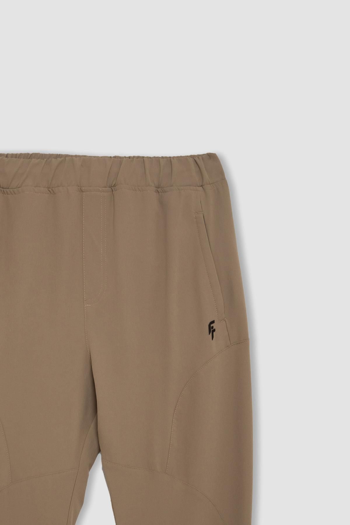 DeFacto-Fit Sportsman Jogger Sweatpants Slim Fit Slim Fit Woven Three Pocket Zippered Leg B2780Ax24Sm 2