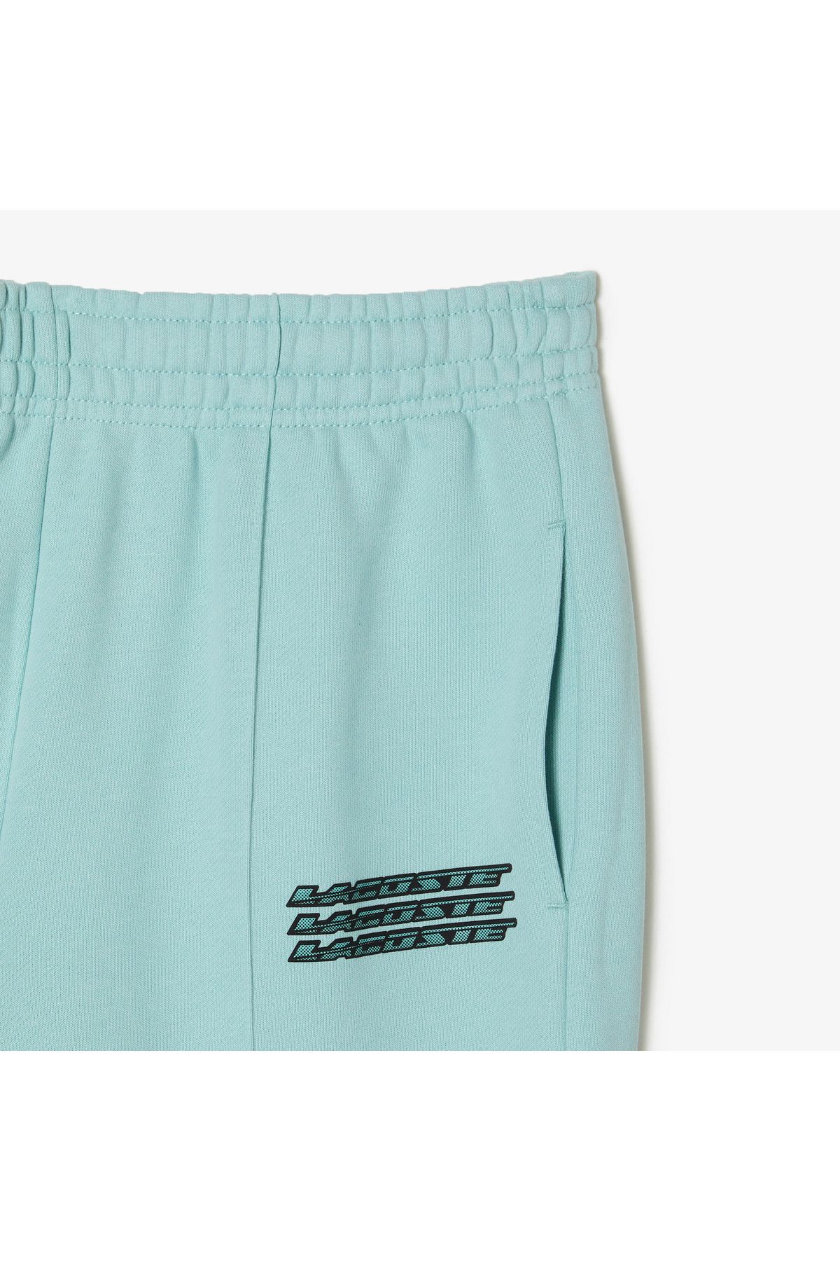 شلوار گرمکن آبی زنانه فعال طرح دار روشن شش Lacoste