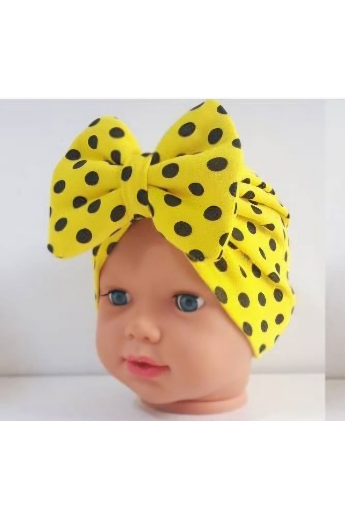 Baby bonnet bandana with polka dot patterned bow