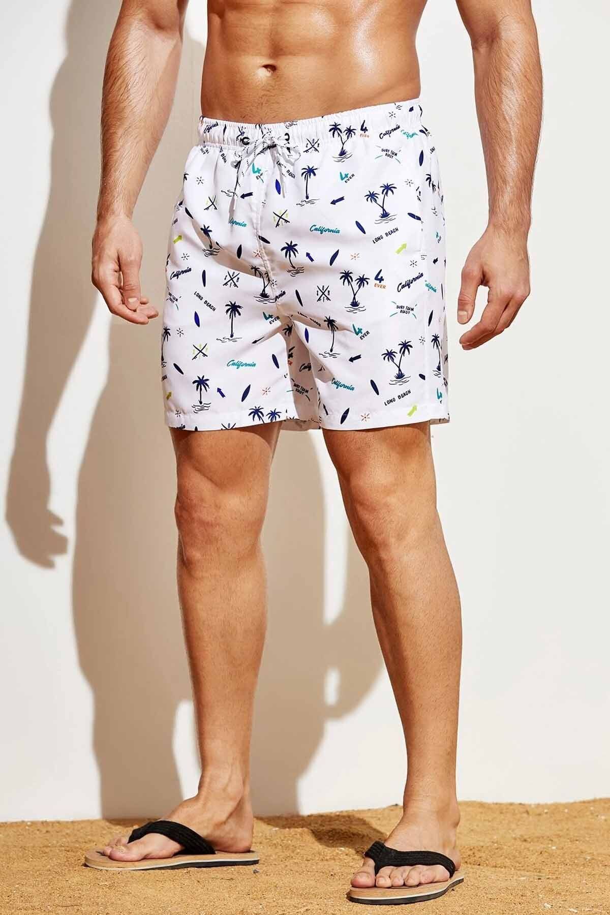 Angelsin-Badeshorts mit Taschen und Palmen-Print für Herren in Standardgröße 7