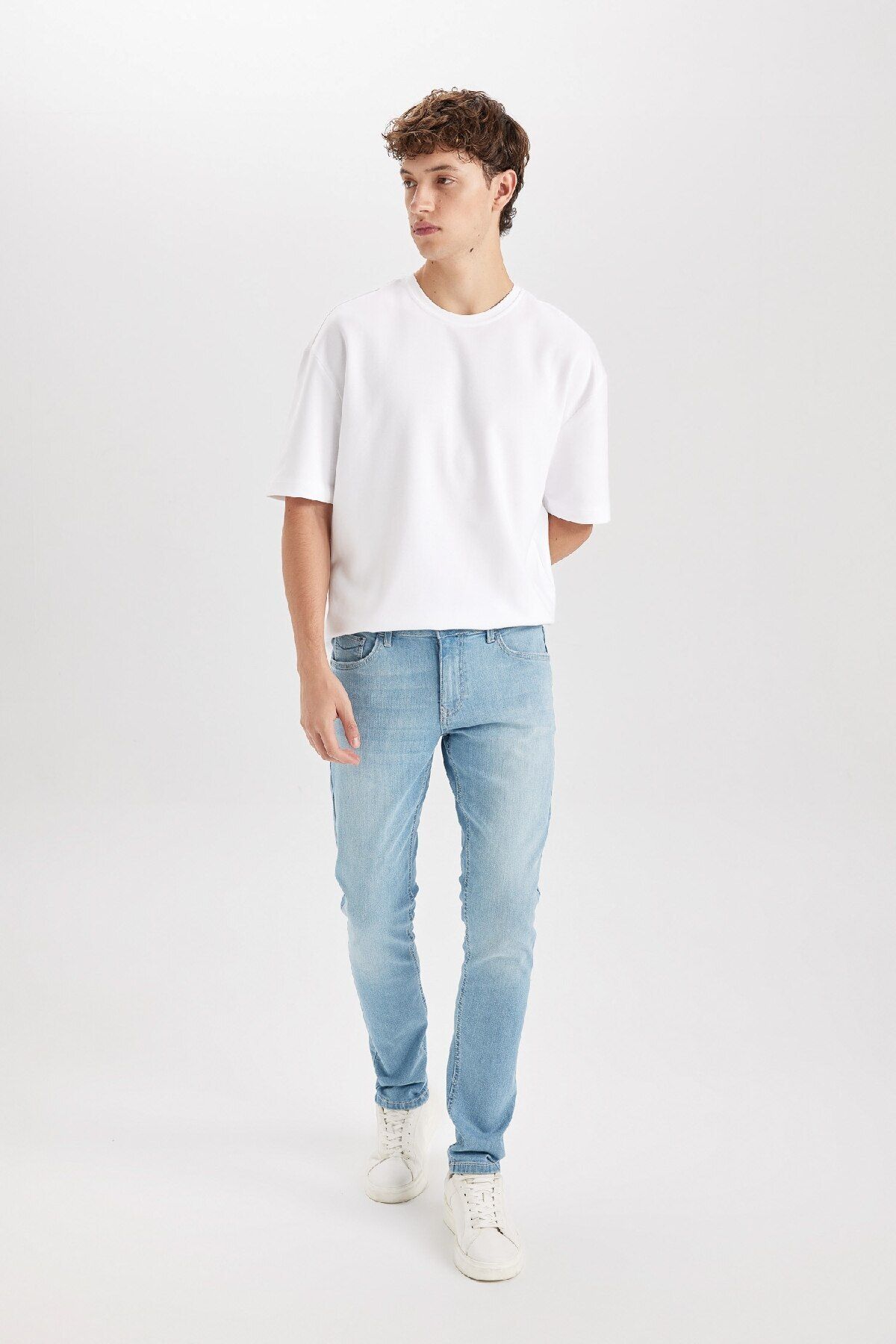 شلوار جین آبی مردانه CARLO SKINNY مناسب کمر نرم و باریک TRAM JEAN TROUSERS D0025AX24AU Defacto