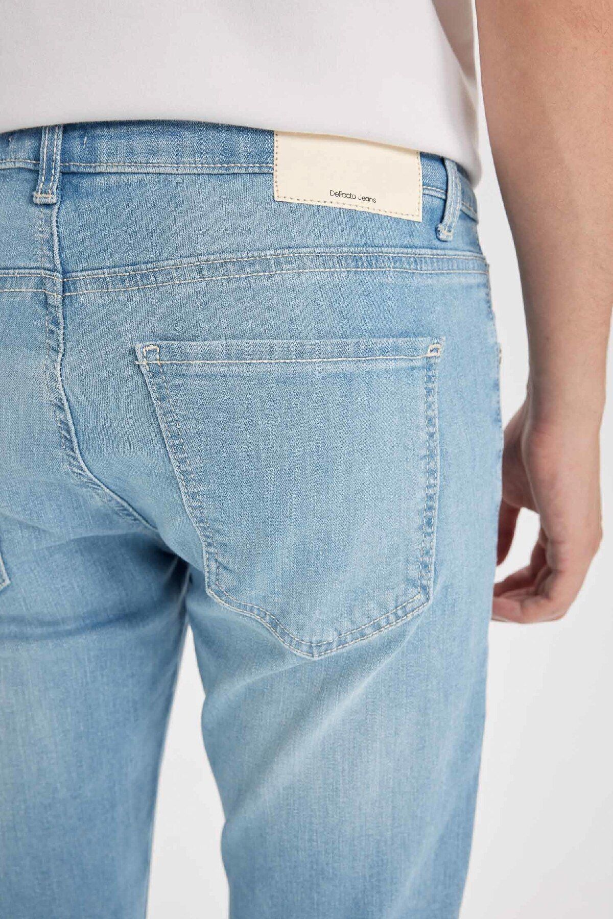 شلوار جین آبی مردانه CARLO SKINNY مناسب کمر نرم و باریک TRAM JEAN TROUSERS D0025AX24AU Defacto