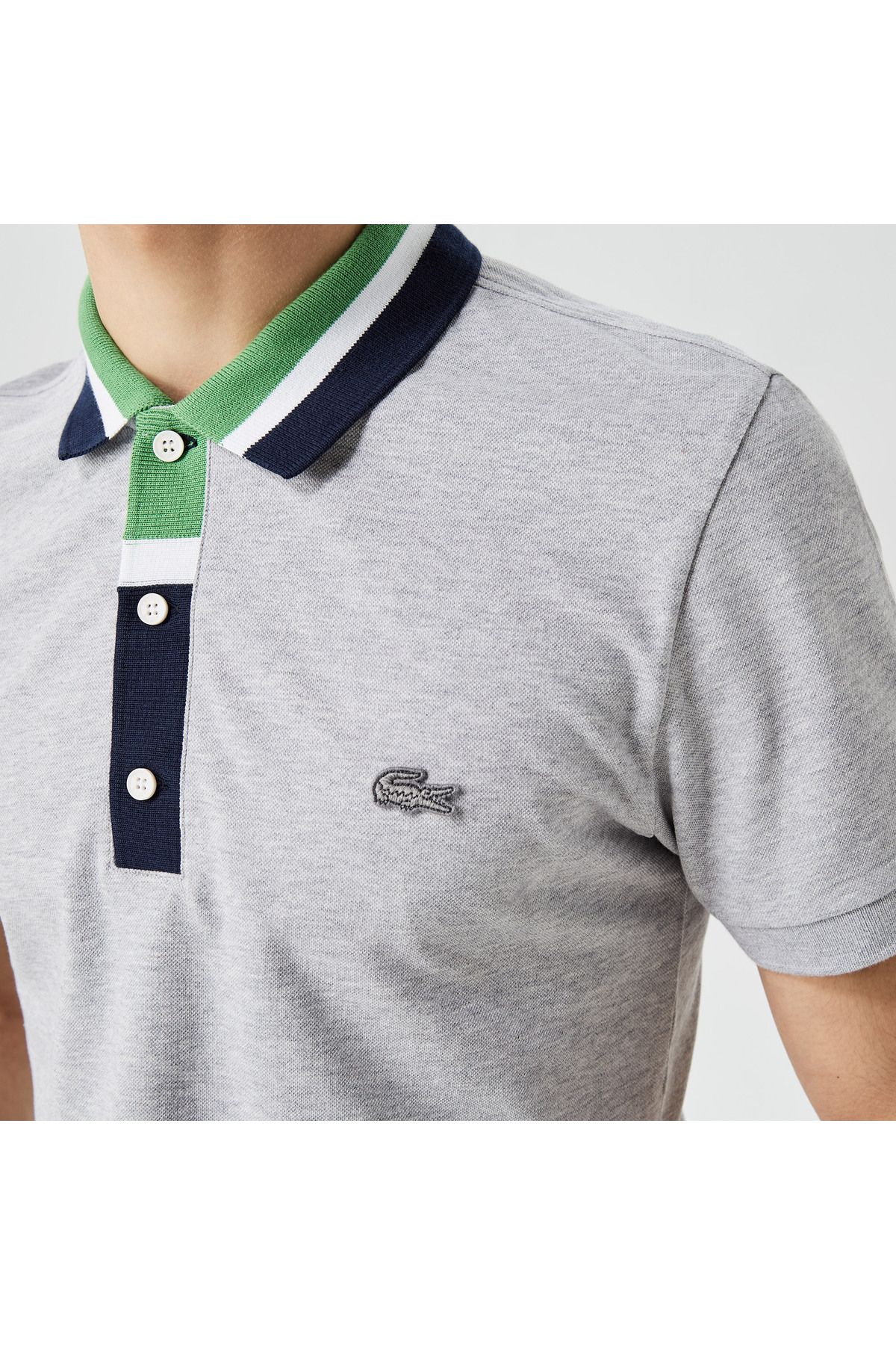 تی شرت یقه پولو خاکستری مردانه بلوک رنگی مناسب چوگان Lacoste