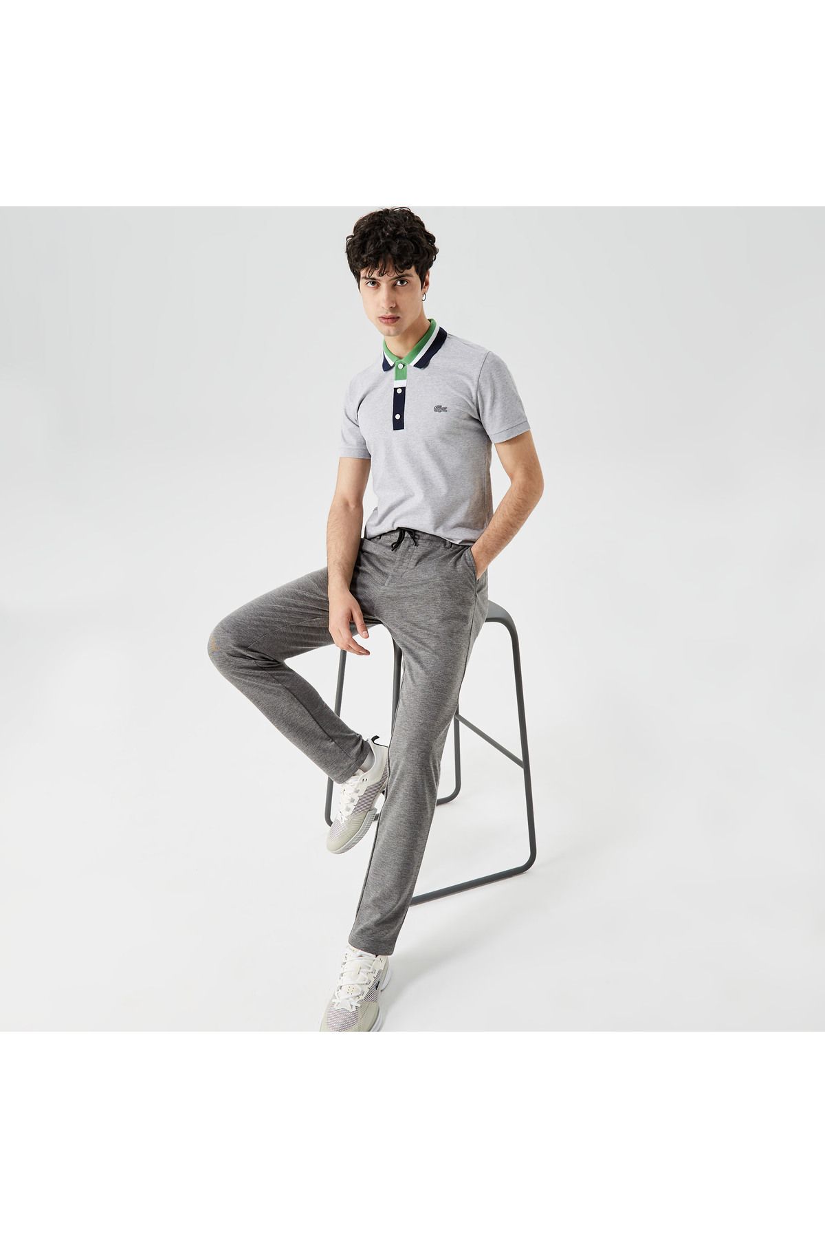 تی شرت یقه پولو خاکستری مردانه بلوک رنگی مناسب چوگان Lacoste