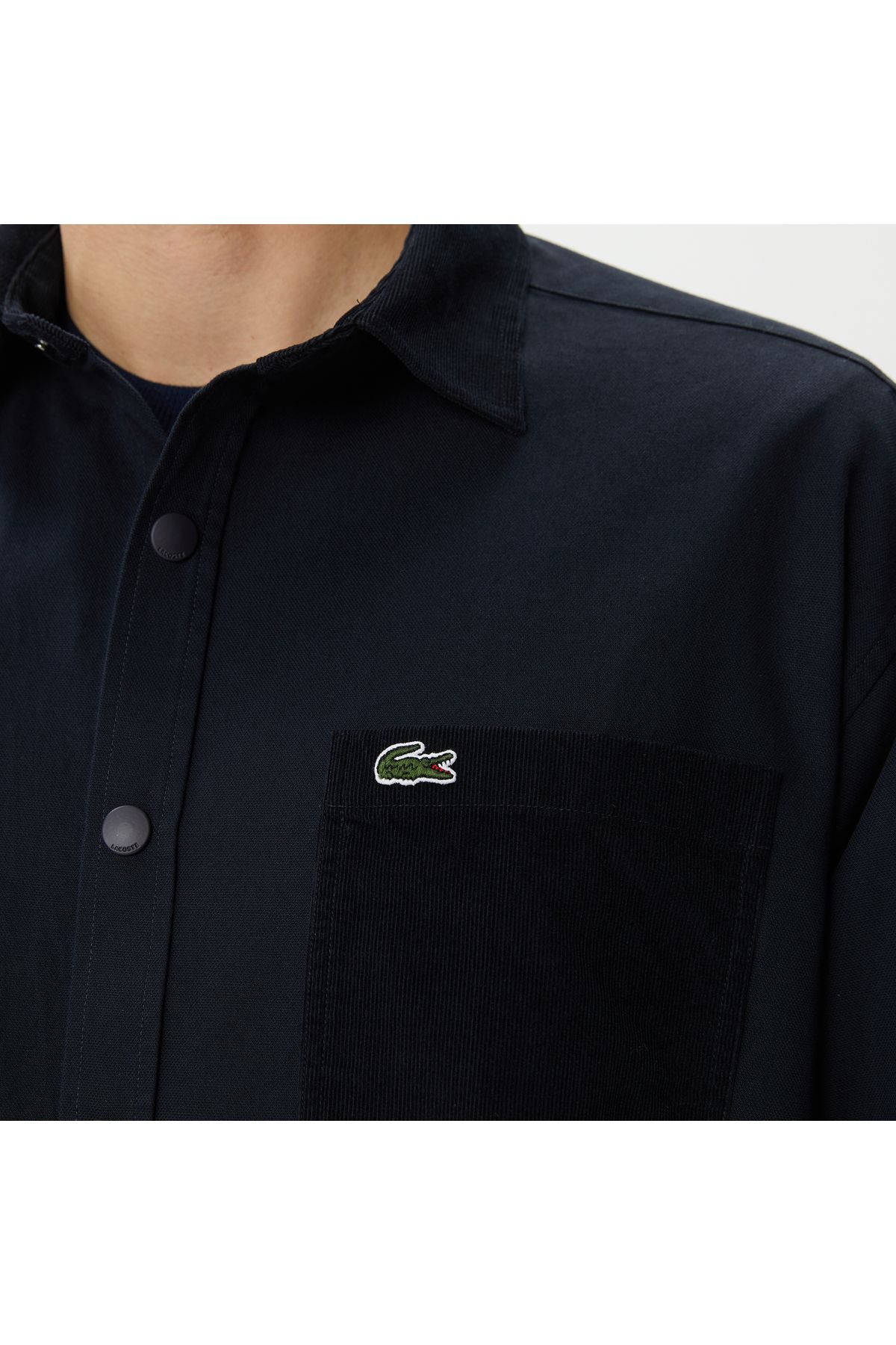 پیراهن / بلوز دکمه دار آبی مردانه رنگ مناسب . Lacoste