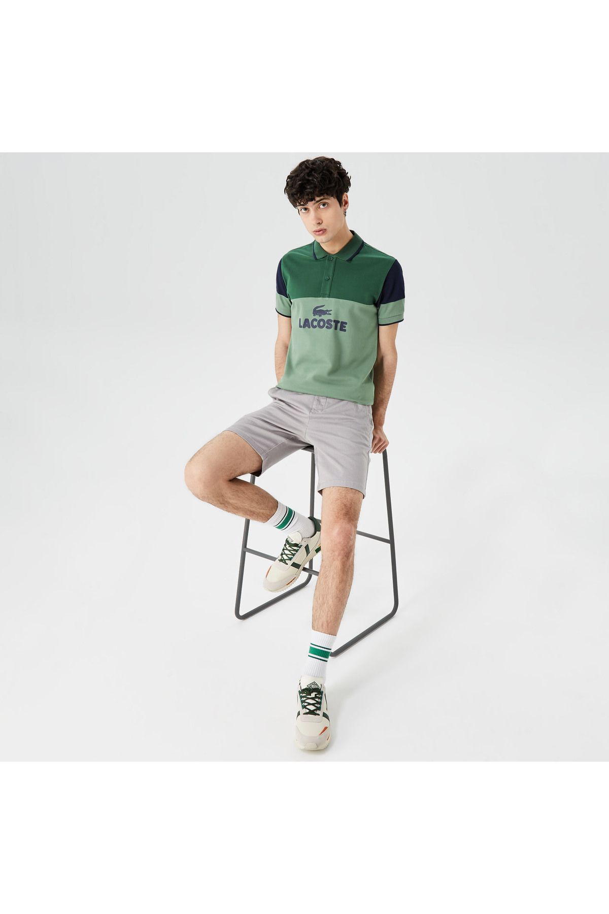 تی شرت یقه پولو سبز مردانه بلوک رنگی باریک چوگان Lacoste