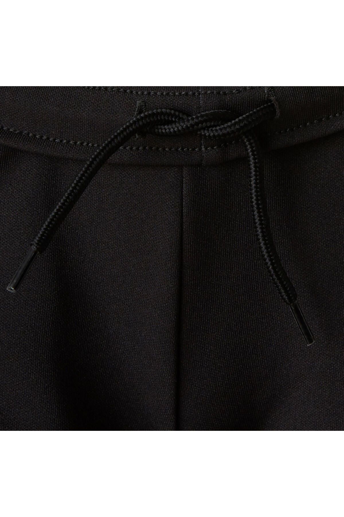 شلوار گرمکن ورزشی مشکی دخترانه و پسرانه بچگانه کفش بچه گانه Kipsta Essentiel Decathlon