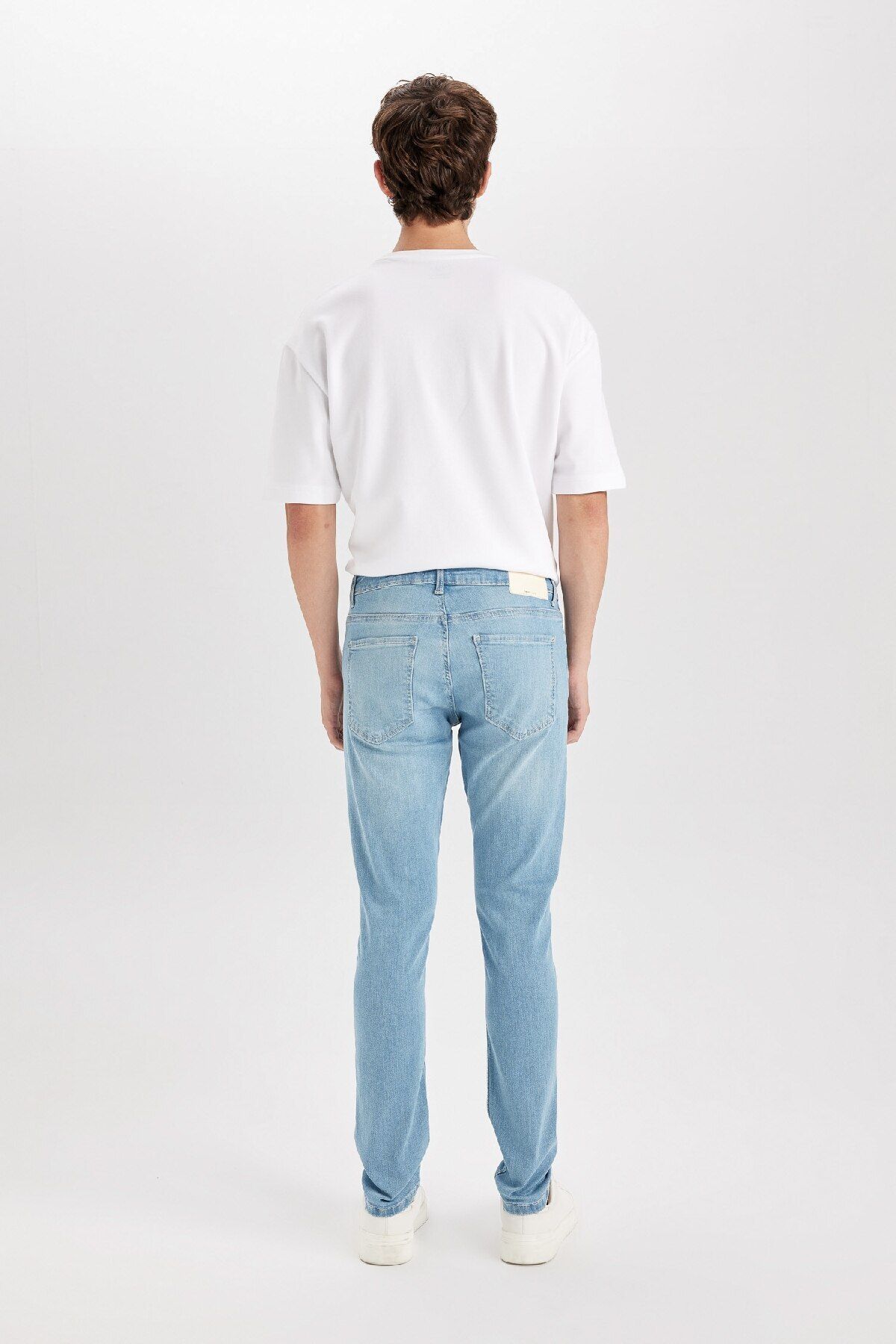 شلوار جین آبی مردانه CARLO SKINNY مناسب کمر نرم و باریک TRAM JEAN TROUSERS D0025AX24AU Defacto