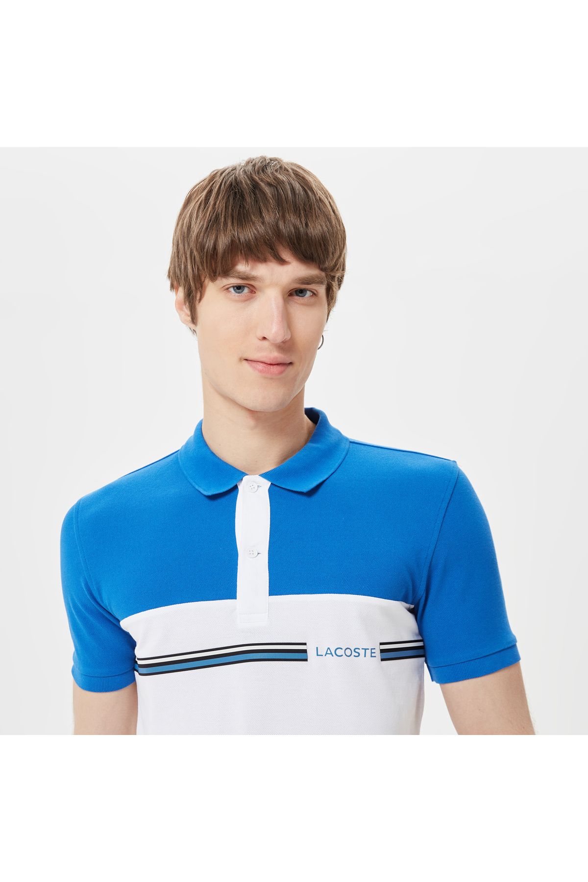 تی شرت یقه پولو آبی مردانه بلوک رنگی باریک چوگان Lacoste