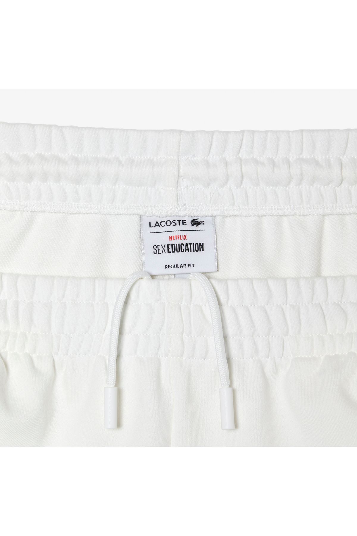شلوار گرمکن سفید مردانه X Netflix 's Cittive Tracksuit TrackSuit Six Lacoste