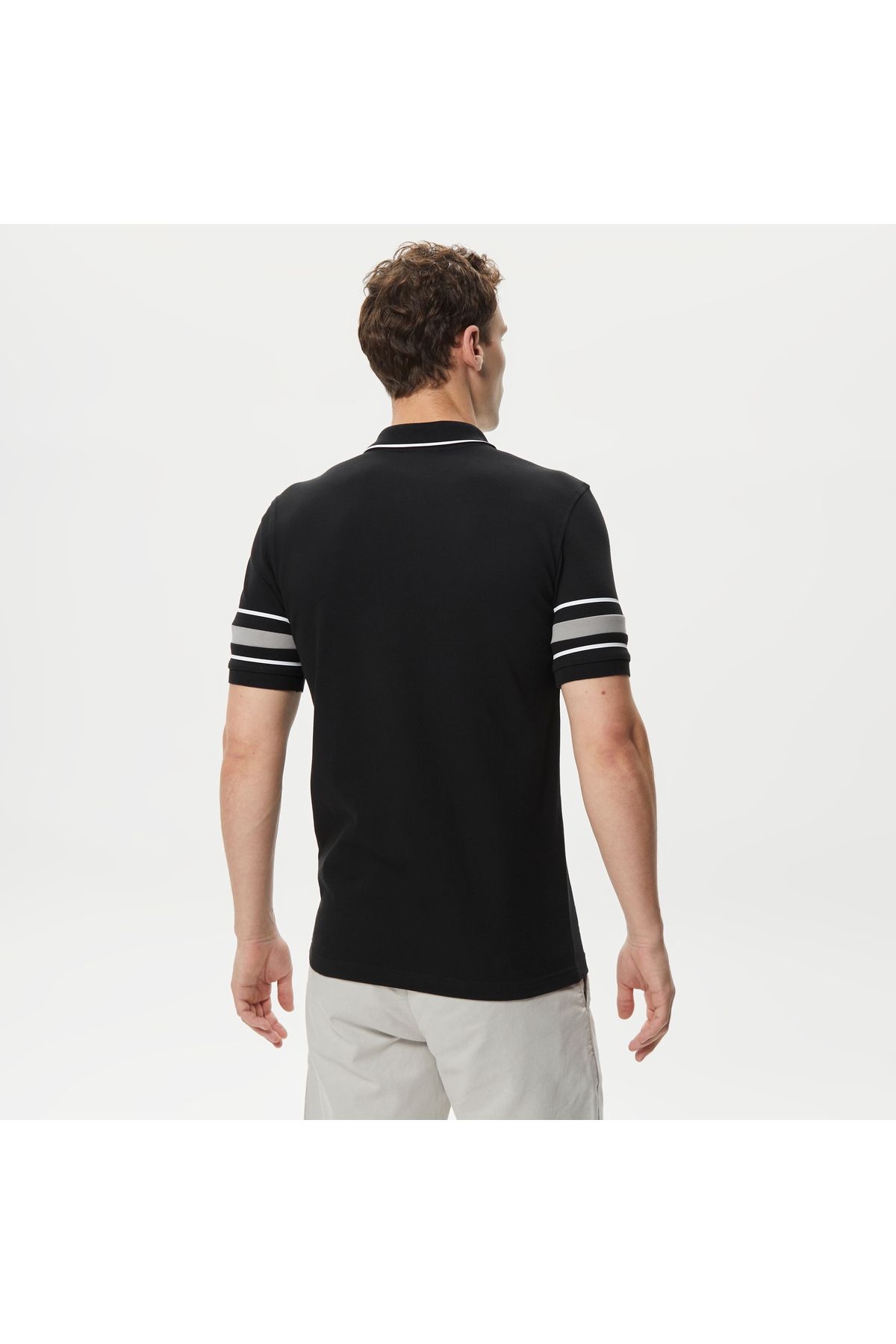 تی شرت یقه پولو زرد مردانه فعال باریک و سیاه چاپی چوگان Lacoste