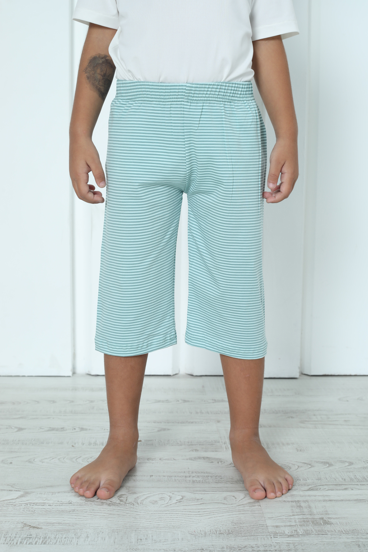 نیکولتا کاپری پسرانه برمودا نخی فیروزه‌ای