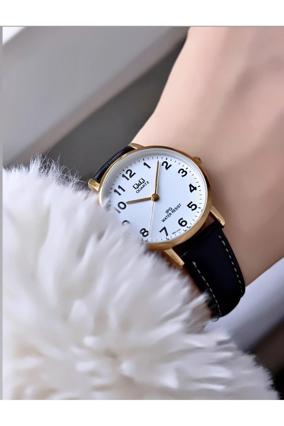 Q&Q-  Minimal Elegant Slim Case Women's Leather Cord Wristwatch 1