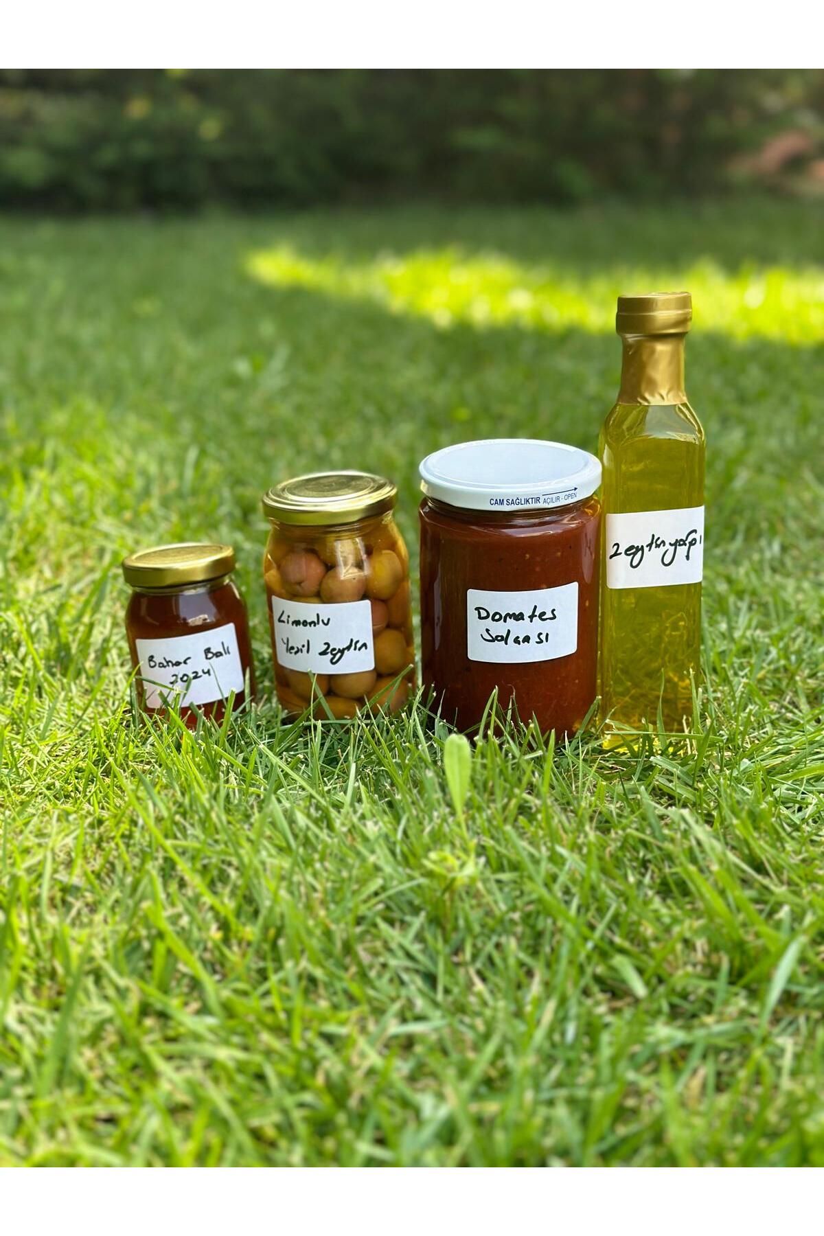 Akay Hediyelik Paket 1 Içeriği; Zeytinyağı, Domates Salçası, Limonlu Çizik Yeşil Zeytin, Bahar Balı