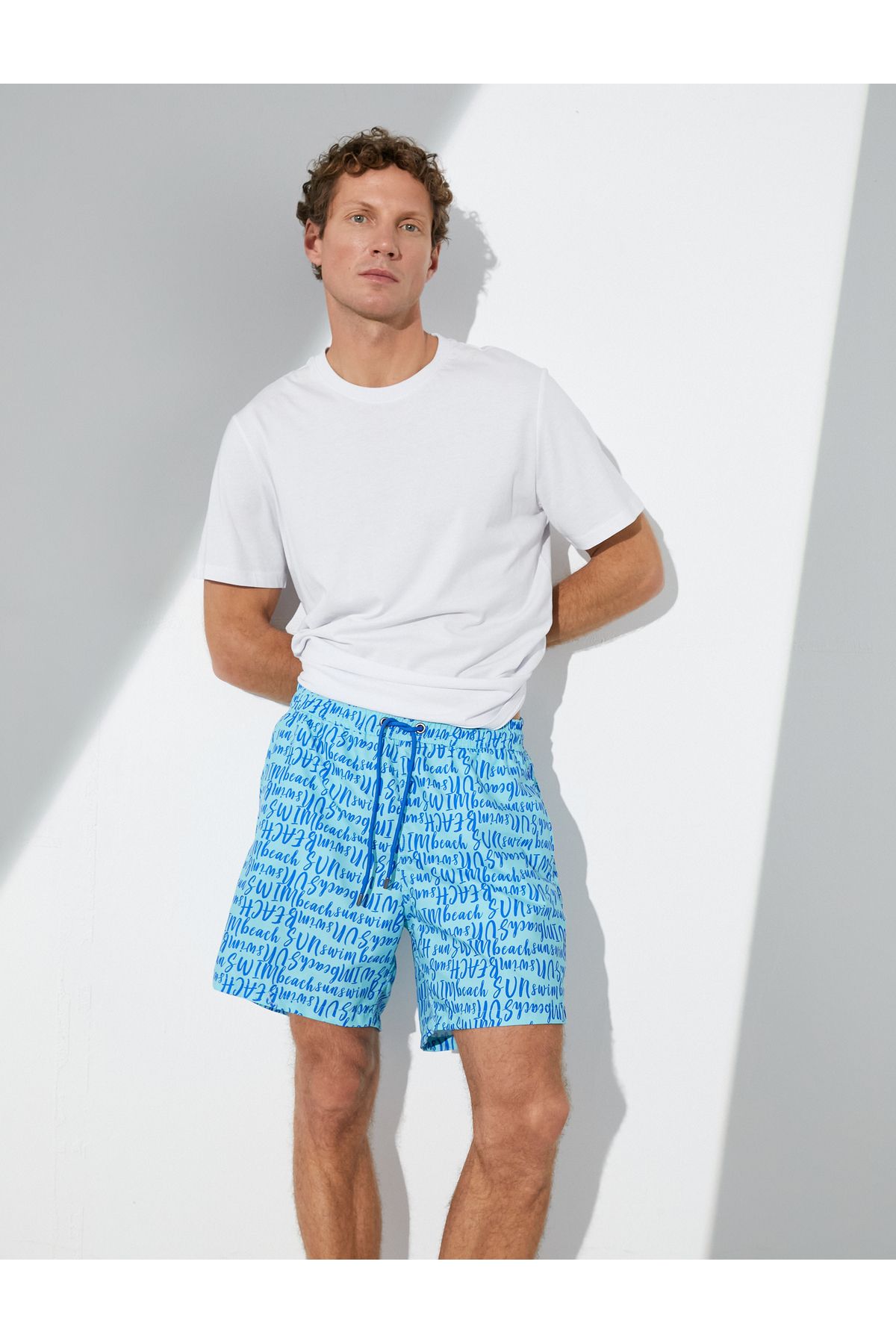 Koton-Swim shorts with text print, lacing at the waist and pockets 4
