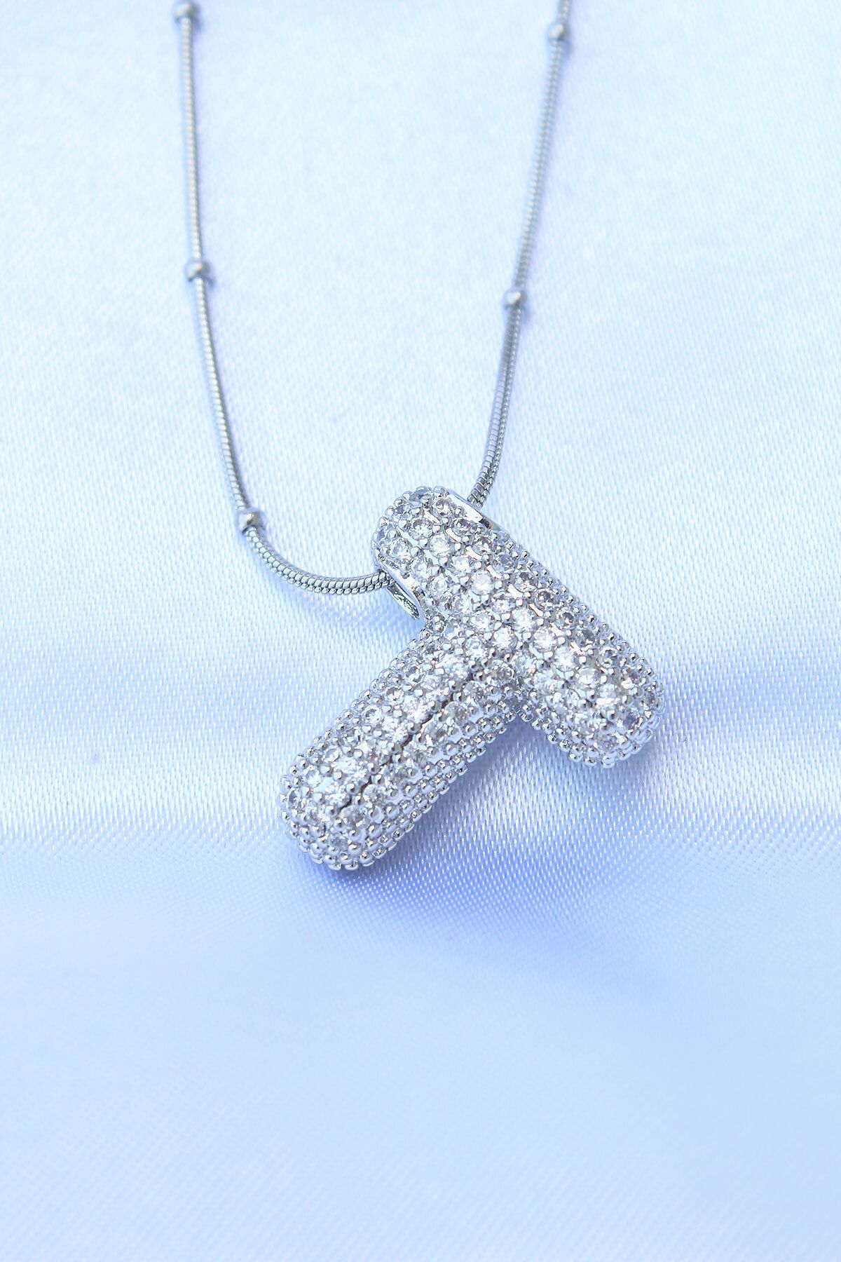 New Things 316L Çelik Zincirli Zirkon Taşlı T Harfli Gümüş Renk Bubble Kolye