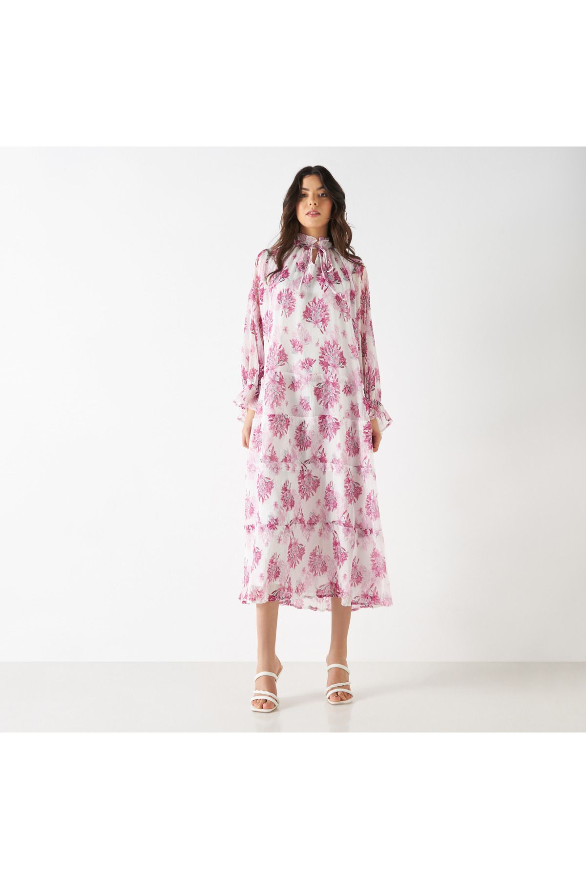 Iconic-All-Over Floral Print Tiered Dress with Long Sleeves and Neck Tie-Ups 1