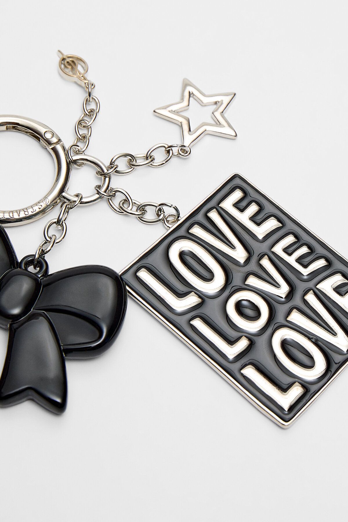 Stradivarius-Bow and charm key ring 5