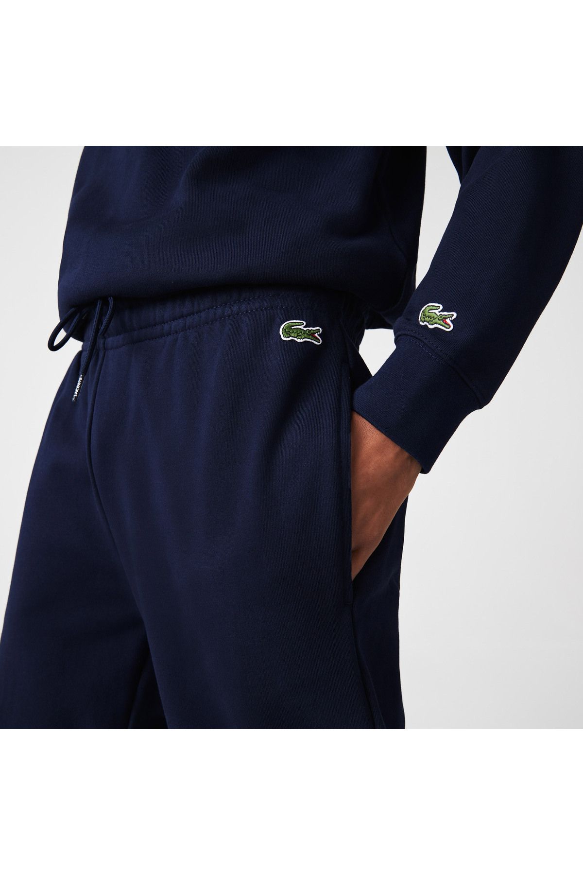 شلوار گرمکن آبی مردانه لباس پر رنگ و سفید شش نفره Lacoste