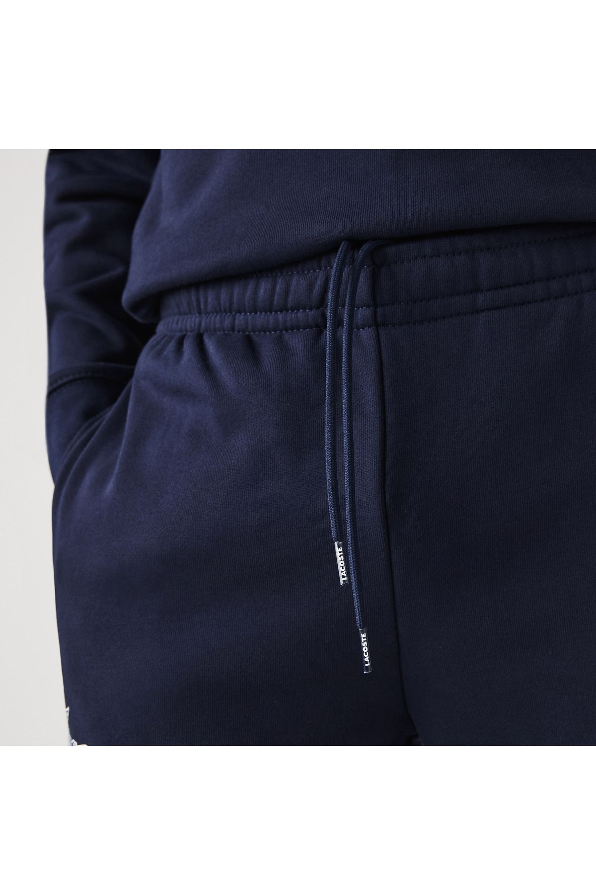 شلوار گرمکن آبی مردانه لباس پر رنگ و سفید شش نفره Lacoste