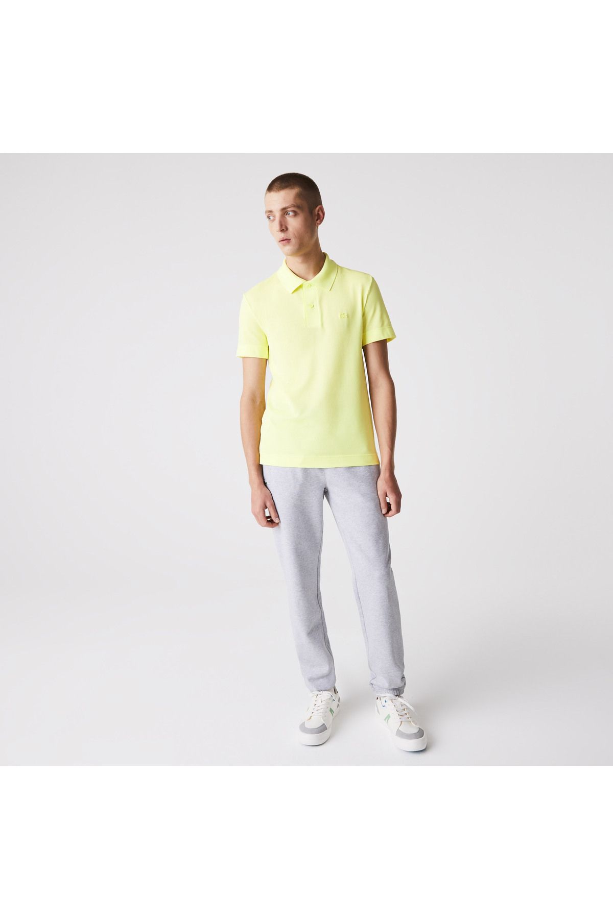 تی شرت یقه پولو زرد مردانه فعال باریک چوگان Lacoste