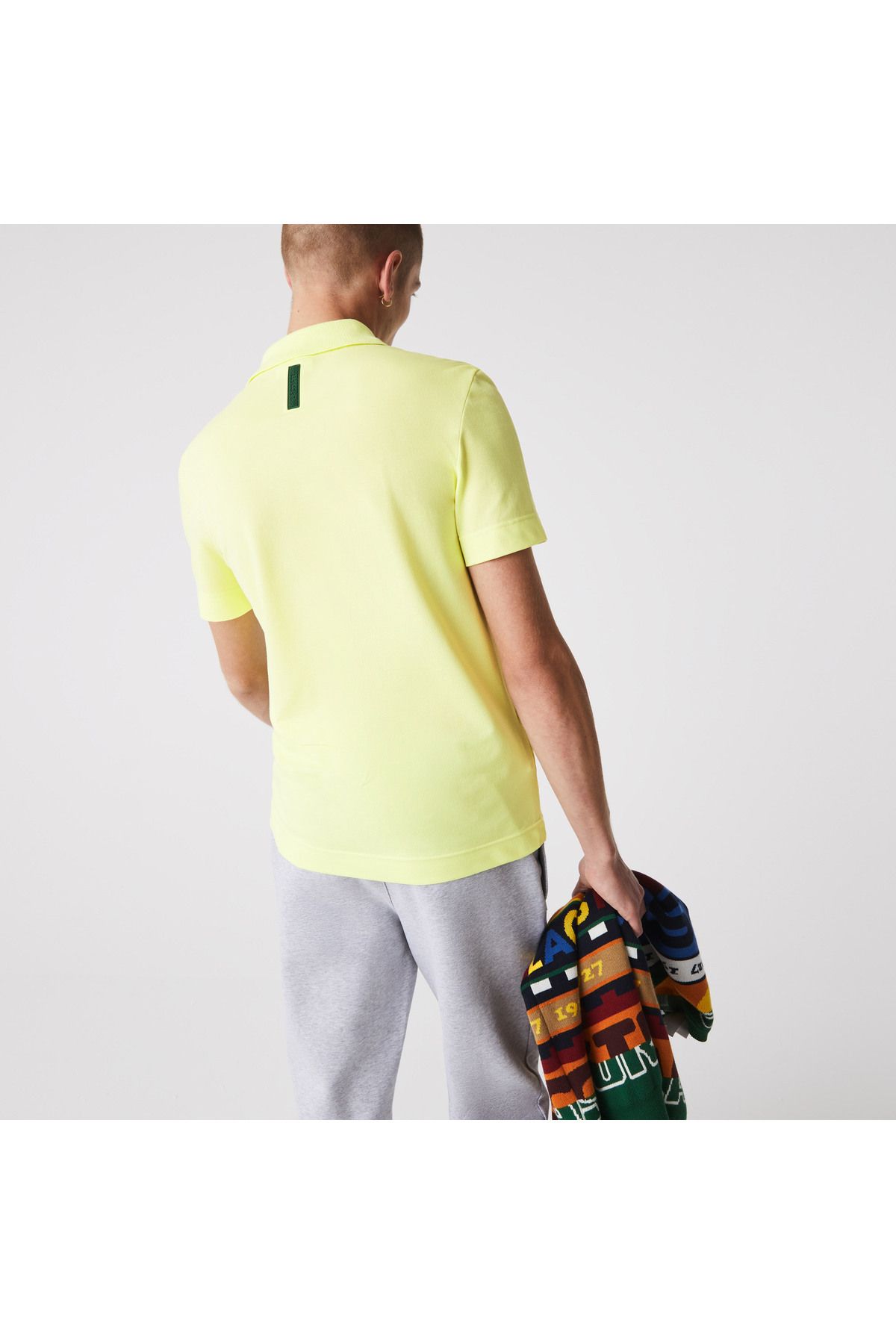 تی شرت یقه پولو زرد مردانه فعال باریک چوگان Lacoste