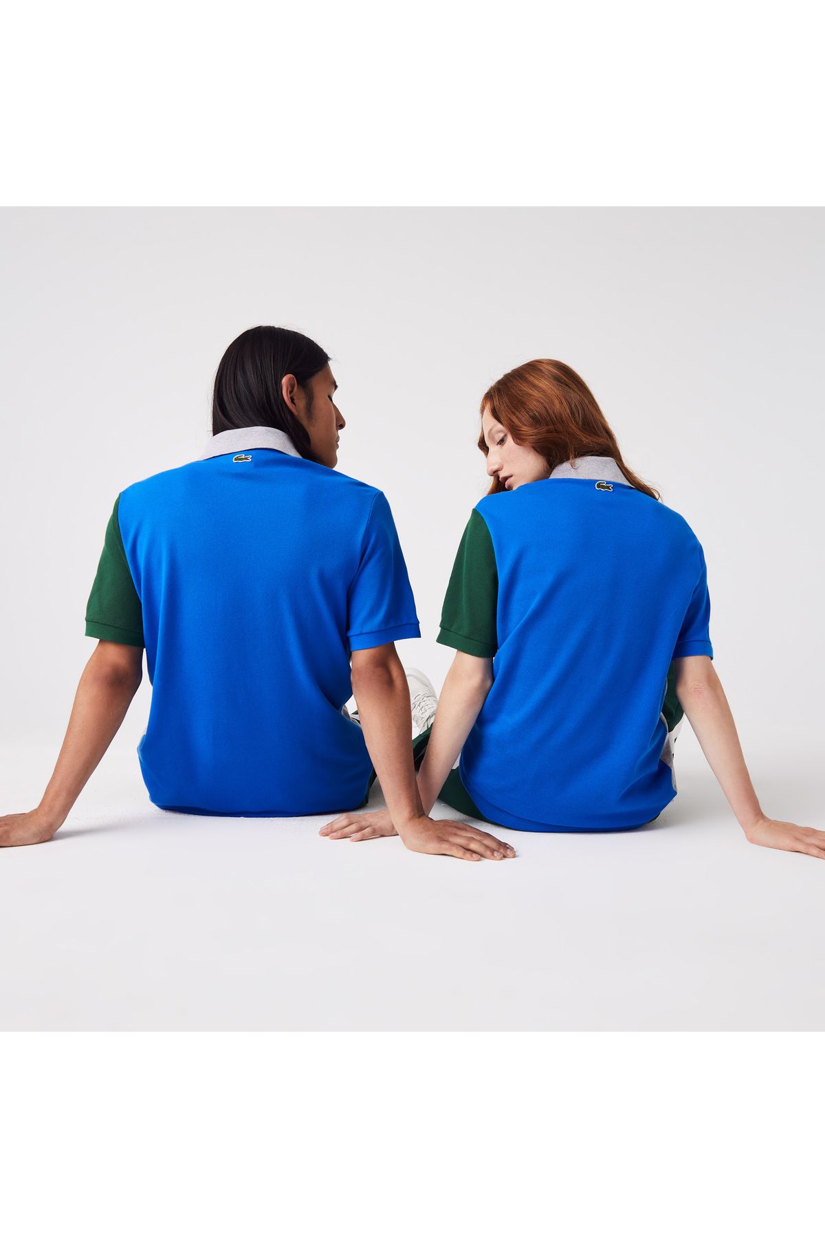 تی شرت یقه پولو مردانه و زنانه من یونیسکس چوگان آبی آرام با بلوک رنگ مناسب Lacoste
