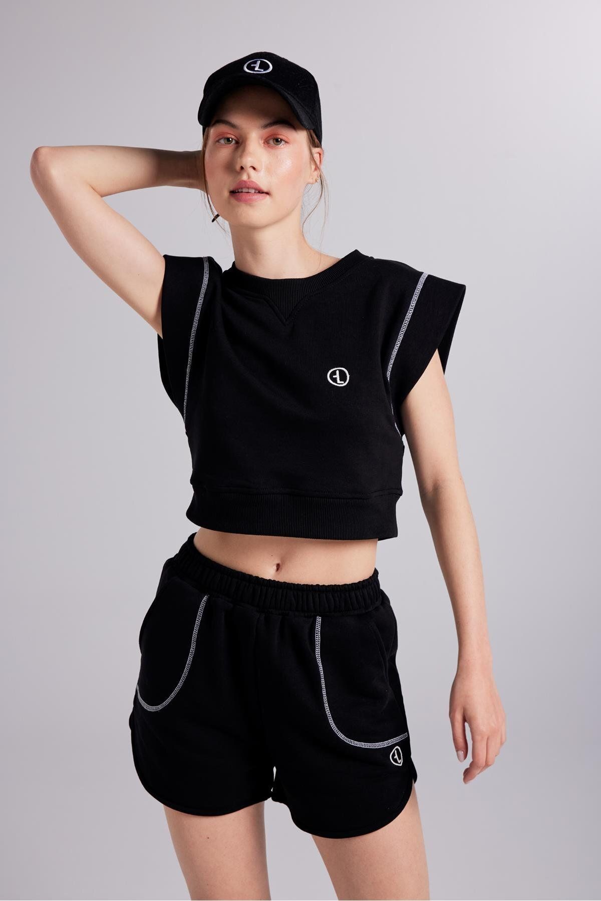 HOLLY LOLLY-Mini Rhode Shorts with Elastic Waist and Contrast Stitching Black 7