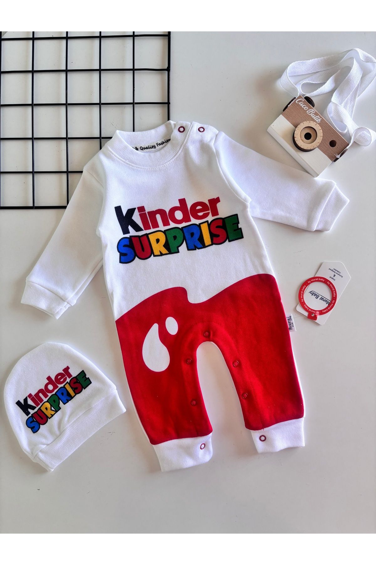 cacobutik-Baby Kinder Surprise Written Romper 1