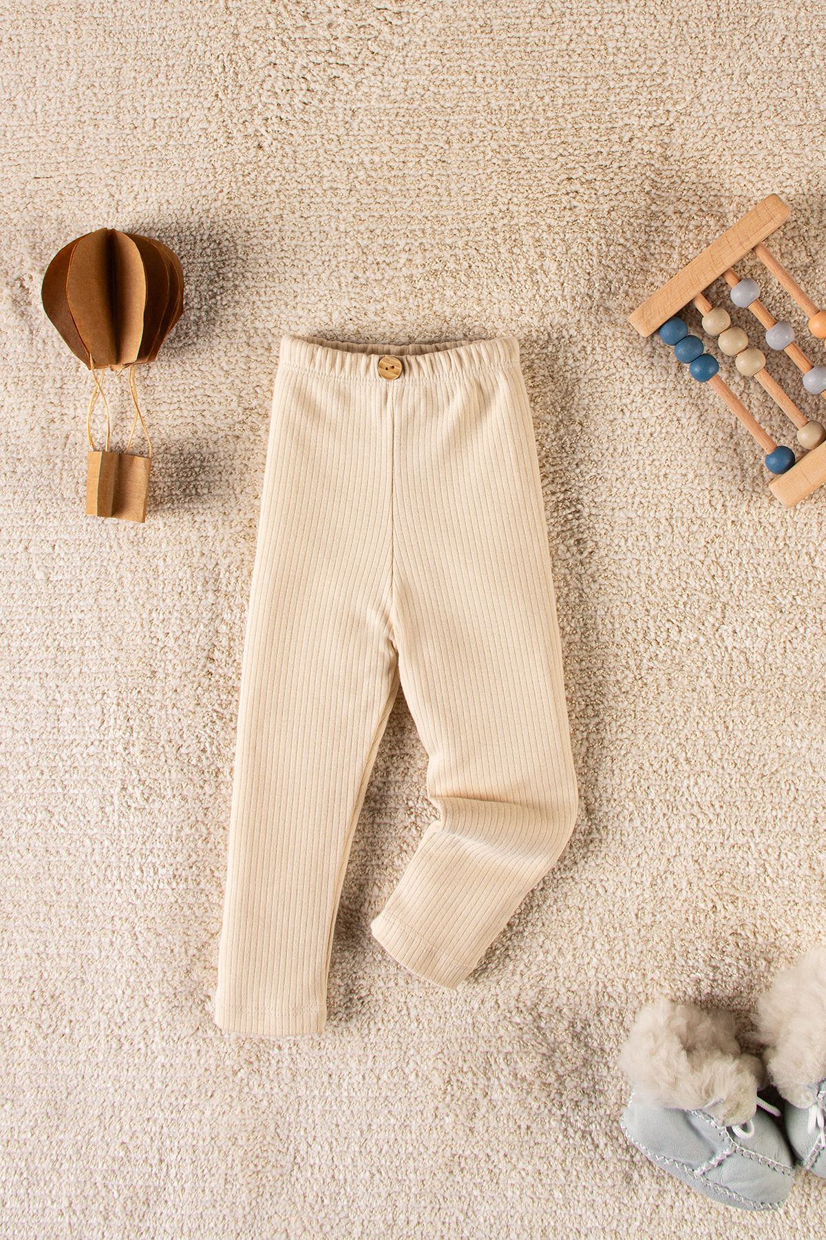 TRENDYOLKIDS Beżowe, Unisexowe, Prążkowane, Dzianinowe Legginsy Dla Niemowląt Tkdaw25ta00007 Unisex - 6-9 miesięcy