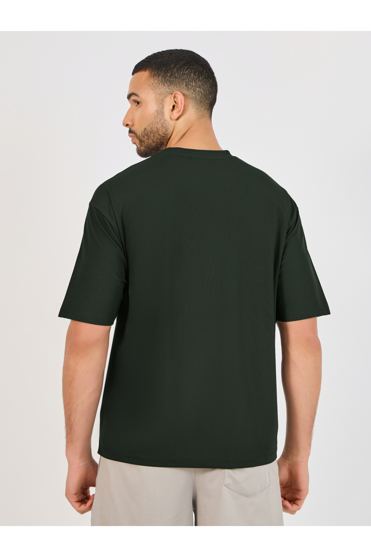 تي شيرت كبير الحجم من نسيج بيكيه ميكرو مع شعار عاك...