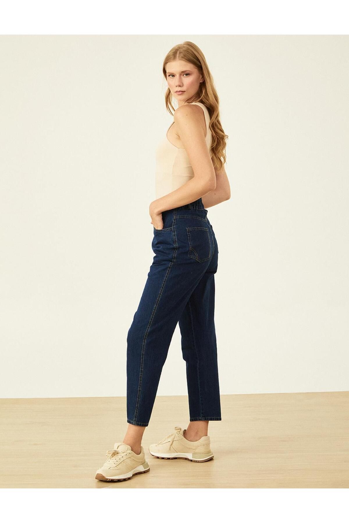 Kayra-Navy Blue Carrot Cut Zippered Denim Trousers 2