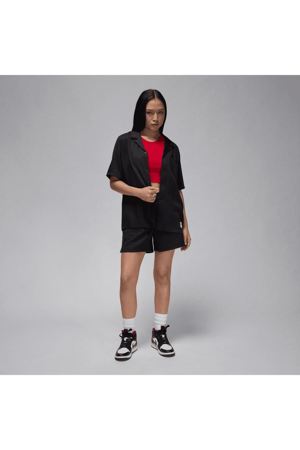 Nike-Jordan Women's Woven Solid Top 1