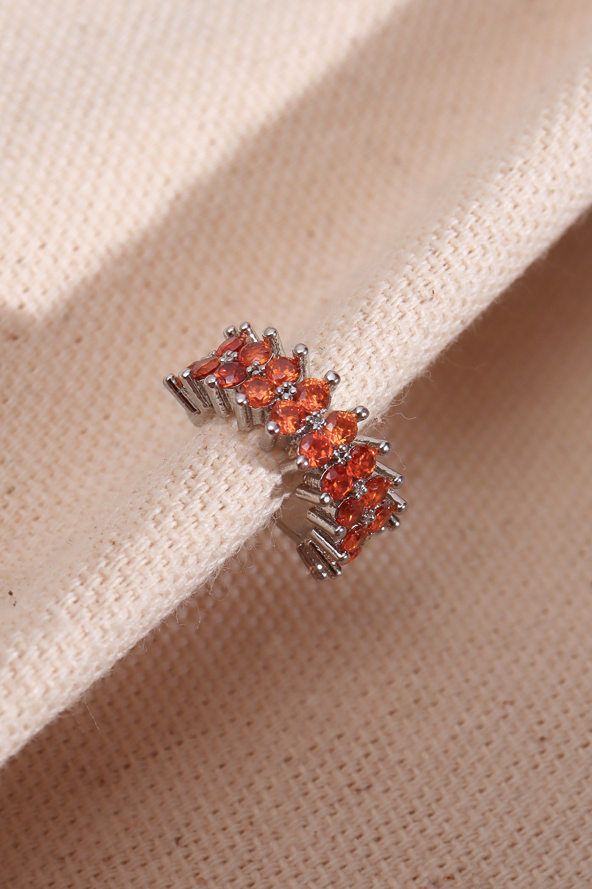 Single Compression Gold Cartilage Earrings with Two Row Orange Gemstone