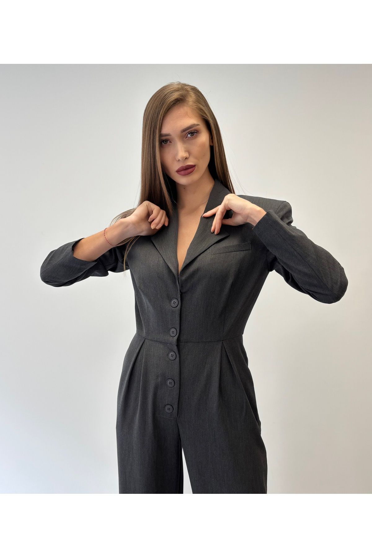 ossons-Buttoned Jumpsuit with Shoulder Padding 1