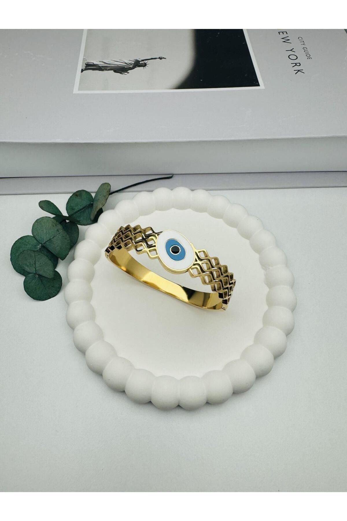 Pİ GLOBAL Göz Detaylı Çelik Kelepçe (Gold )2012