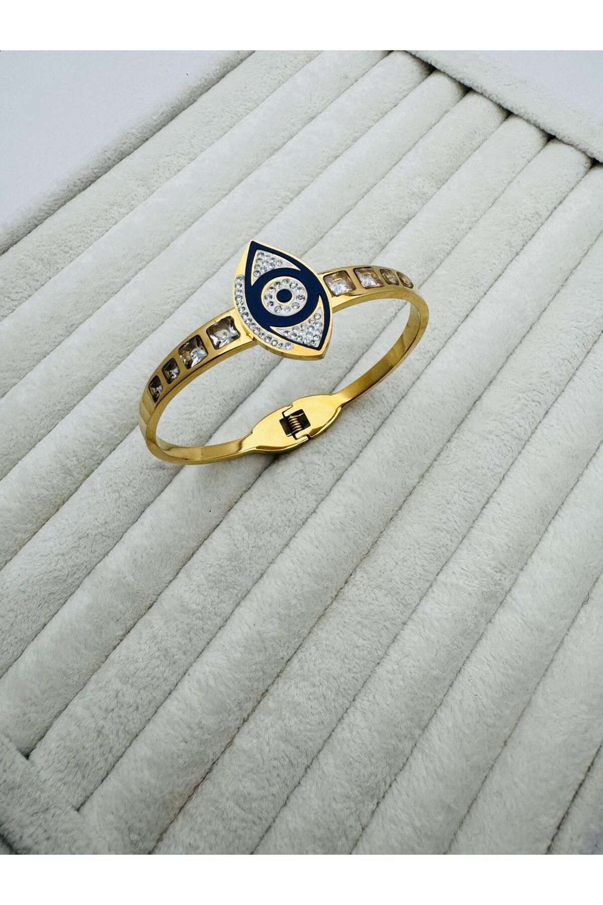 GLY ÇLKBİJUTERİ Göz Detaylı Taşlı Çelik Kelepçe (Gold )2011