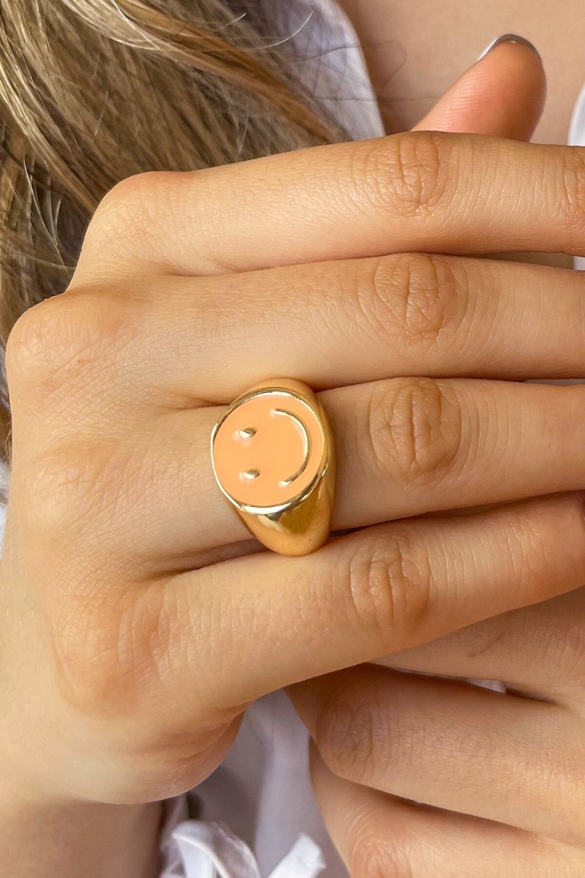 Smiling sales face ring