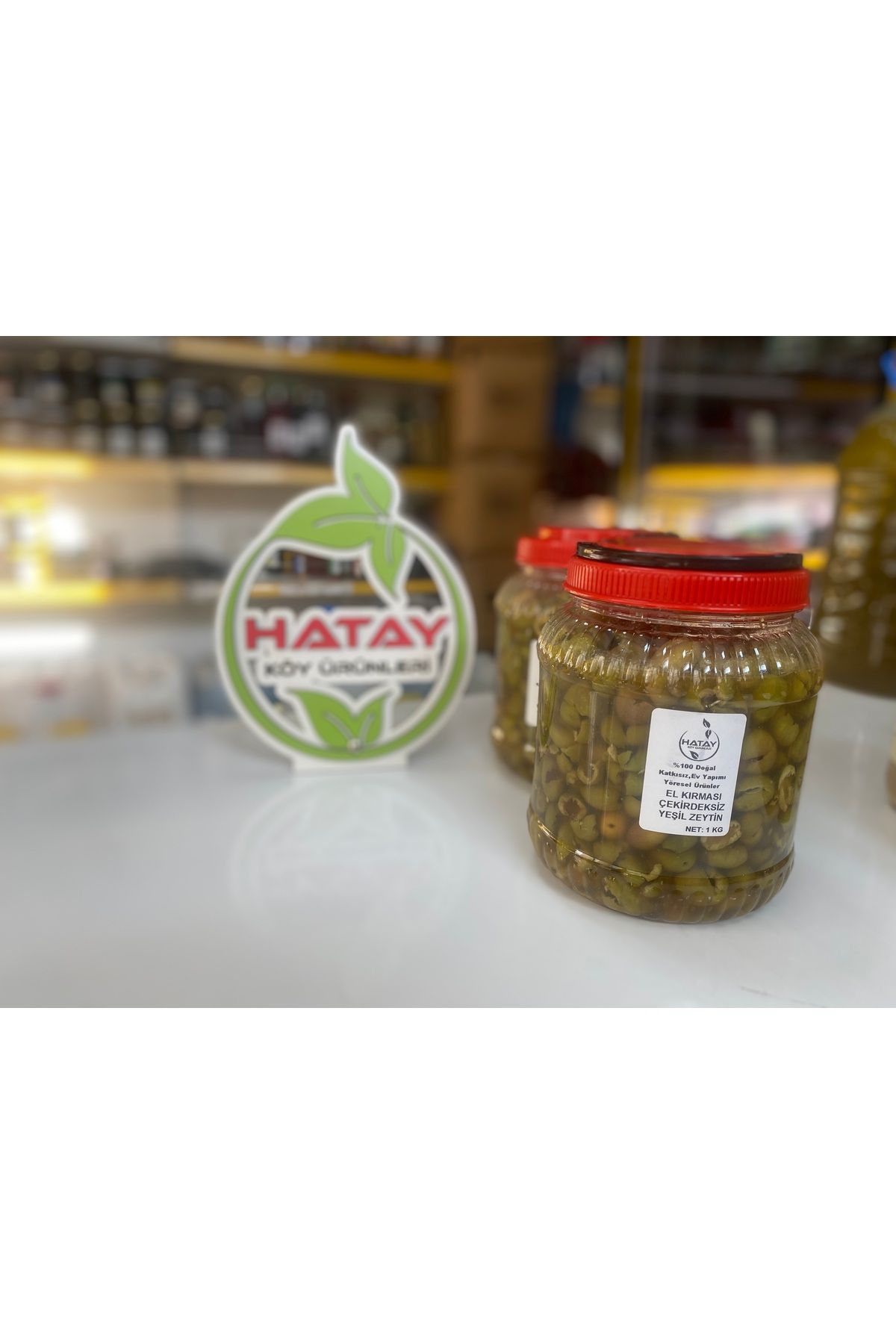 HATAY KÖY ÜRÜNLERİ EL KIRMASI ÇEKİRDEKSİZ YEŞİL ZEYTİN 5 KG PET(NET:2500GR)