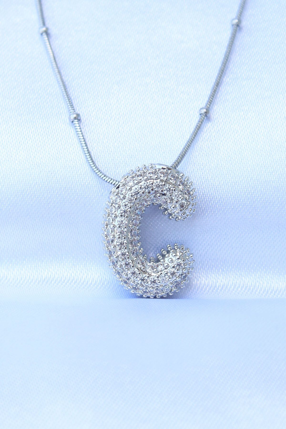 New Things 316L Çelik Zincirli Zirkon Taşlı C Harfli Gümüş Renk Bubble Kolye