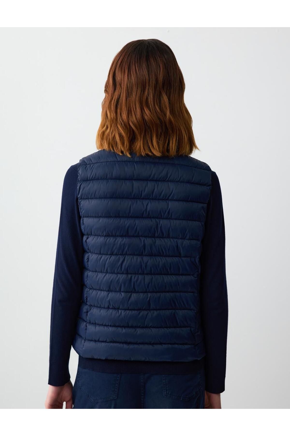 Jimmy Key-Navy Blue Zippered Sleeveless Puffer Vest with Snap Detail 7