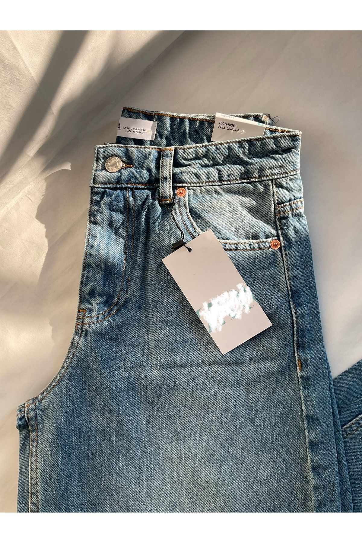 Butik Modern Buz Mavisi Jean - Şık ve Rahat Tasarım